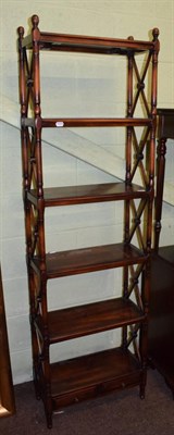 Lot 434 - A reproduction six tier hardwood bookshelf with two drawers, 189cm high