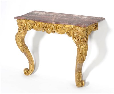 Lot 1235 - An Early 19th Century Gilt and Gesso Console Table, the later pink and white serpentine marble...