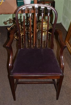 Lot 447 - A late 19th century mahogany armchair with drop in seat