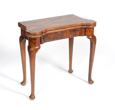 Lot 1236 - A George II Walnut, Crossbanded and Feather Banded Foldover Card Table, early 18th century, the...