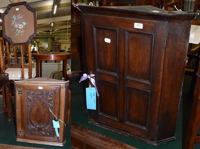 Lot 477 - A Victorian walnut pole screen; a carved oak and pine small corner cupboard; and another oak corner