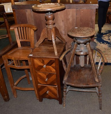 Lot 479 - A German secession tall bar chair; two tripod stools; an open tub chair; and a small three...