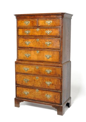 Lot 1240 - A George II Walnut, Featherbanded and Oak-Sided Chest on Chest, 18th century and later, the cavetto