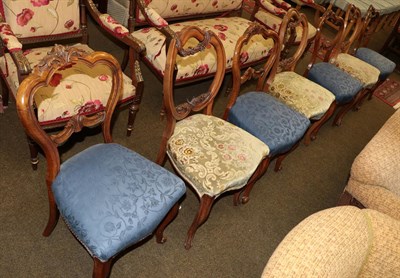 Lot 505 - A set of four Victorian walnut framed dining chairs and a set of three Victorian walnut dining...