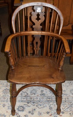 Lot 508 - An elm-seated Windsor chair, pierced splat, crinoline stretcher