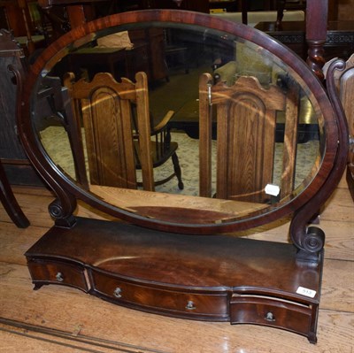 Lot 513 - An Edwardian oval dressing table mirror above three drawers