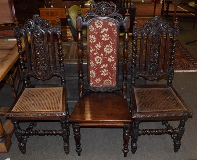 Lot 517 - A pair of Victorian carved oak hall chairs with caned seat; and a Victorian mahogany and...