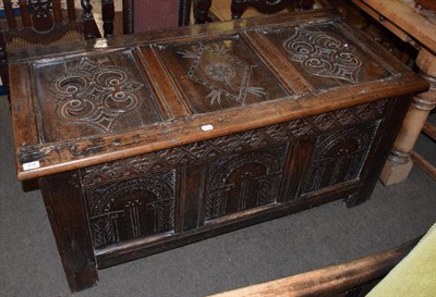 Lot 518 - A late 17th century joined oak chest with hinged lid, 131cm wide