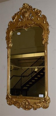 Lot 541 - A Victorian gilt, gesso and ebonised overmantle mirror, with original mercury plate, 114cm by...