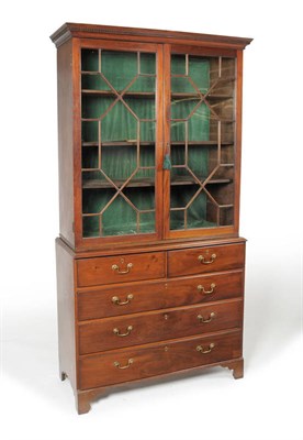 Lot 1245 - A George III Mahogany Bookcase on Chest, late 18th century, the dentil cornice above glazed...