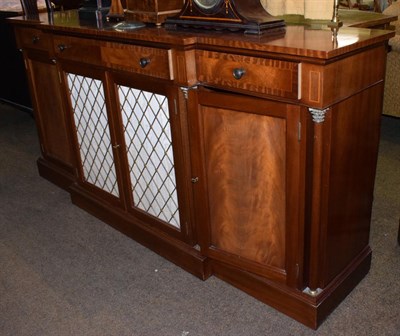 Lot 552 - A reproduction mahogany and crossbanded sideboard with metal grille doors, 195cm wide