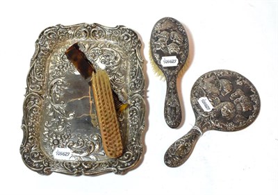 Lot 140 - A silver dressing table tray, oblong and with openwork border; and a five piece dressing table set