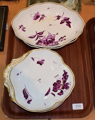 Lot 210 - A Derby porcelain part dessert service, circa 1820, painted in purple monochrome with flower sprays