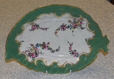 Lot 211 - A Worcester porcelain dessert dish, circa 1775, moulded as two overlapping leaves painted with...