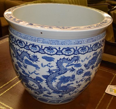 Lot 309 - A large hand painted 20th century blue and white jardiniere or fish bowl