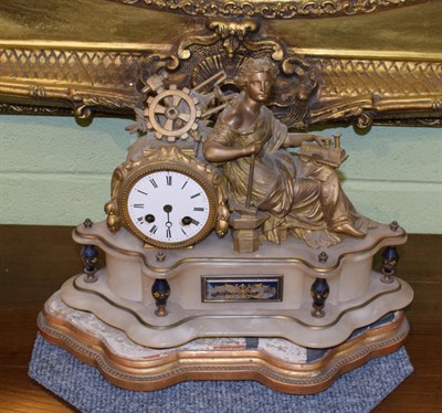 Lot 397 - A late 19th century French gilot spelter mantel clock of railway interest together with a stand.