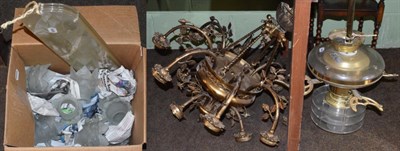 Lot 413 - A 20th century brass twelve light chandelier; together with a 20th century ceiling light and fan