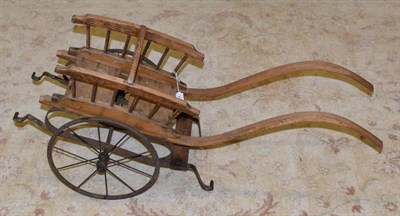 Lot 464 - A pine and metal Dog cart bearing a plaque for William Ling