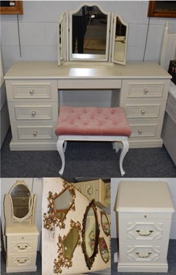 Lot 564 - A cream dressing table with six drawers; two cream dressing table mirrors; a dressing table...