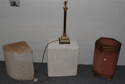 Lot 565 - A brass and onyx table lamp; a Lloyd loom linen basket; and two others