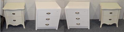 Lot 568 - A pair of white three-drawer bedside cabinets; together with a pair of cream two-drawer bedside...