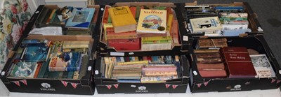 Lot 584 - A large collection of books by P.G Wodehouse; Ian Fleming; G.A Henty etc (seven boxes)