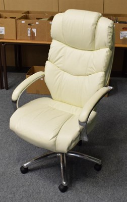 Lot 587 - A modern cream leather and chrome executive office armchair