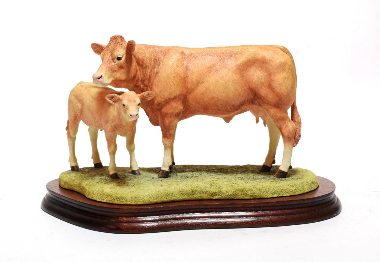 Lot 33 - Border Fine Arts 'Blonde D'Aquitaine Cow and Calf', model No. B0353 by Kirsty Armstrong,...