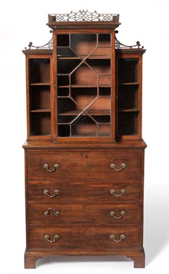 Lot 1264 - A George III Mahogany Display Cabinet/Secretaire Chest, late 18th century, with fret cut...