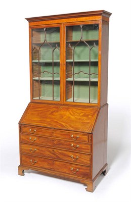 Lot 1267 - A Mahogany, Satinwood Banded and Ebony Strung Bureau Bookcase, circa 1800, with conforming...