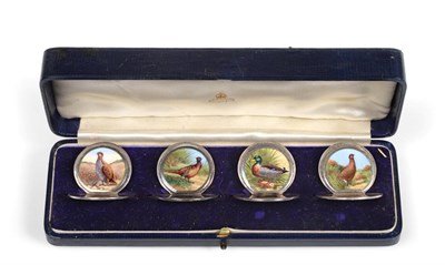 Lot 3053 - A Set of Four George V Enamelled Silver Place-Card Holders, by John Collard Vickery, Chester, 1911