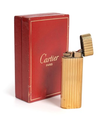 Lot 3071 - A Gold and Gold-Plate Mounted Cigarette-Lighter, Retailed by Cartier, 20th Century, Model...