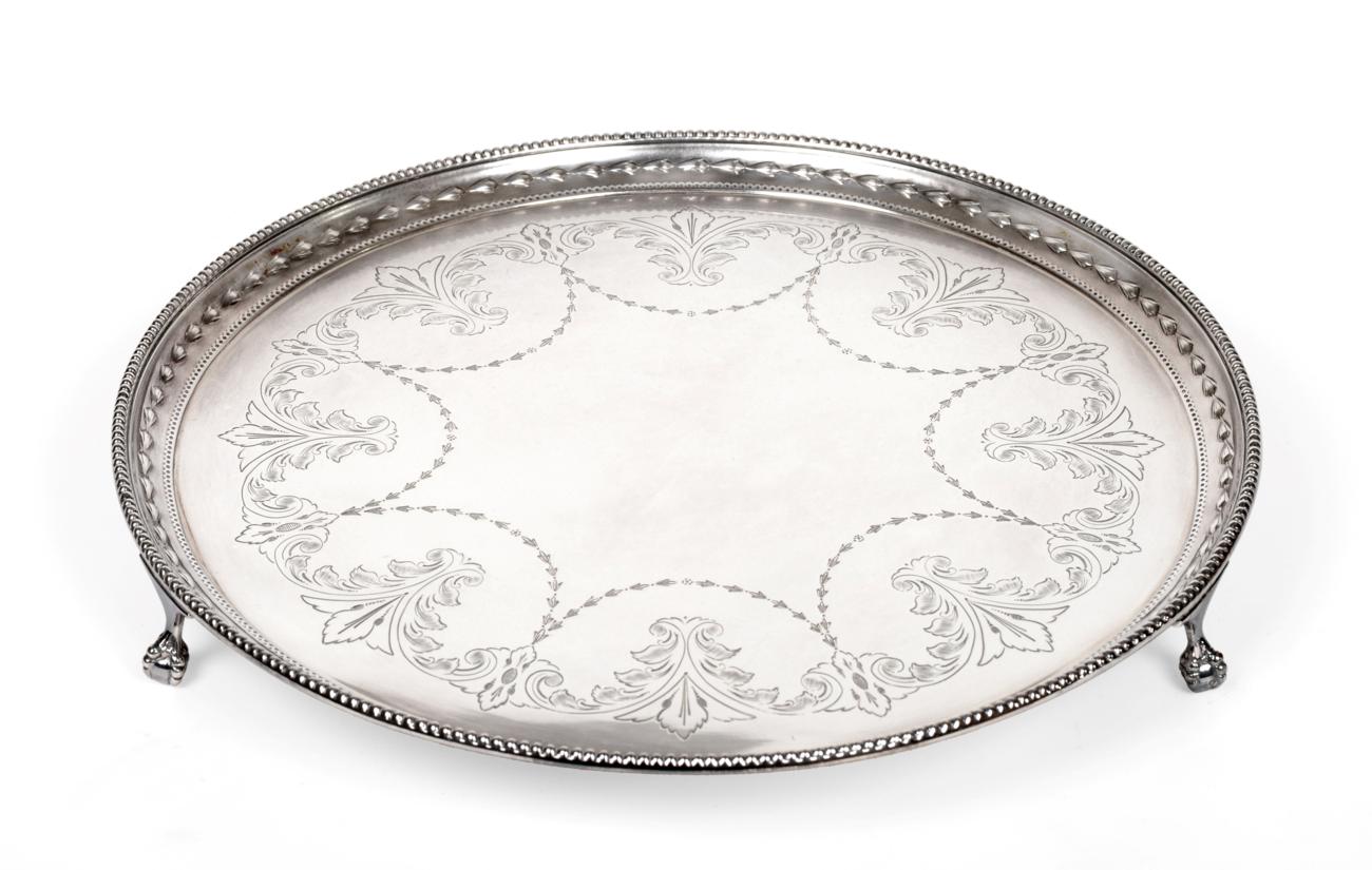 Lot 3126 - An Elizabeth II Silver Salver, by Mappin and Webb, Sheffield, 1970, circular and on ball and...