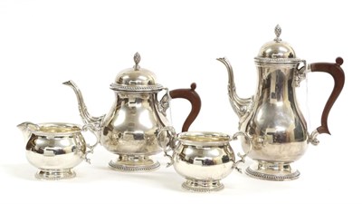 Lot 3136 - A Three-Piece Elizabeth II Silver Tea-Service and a Coffee-Pot En Suite, The Tea-Service by...
