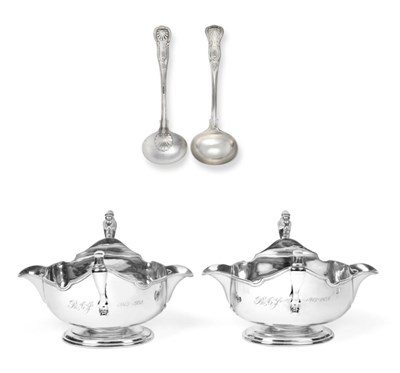 Lot 3143 - A George V and A George VI Silver Sauceboat and Two Victorian Silver Sauce-Ladles, the...