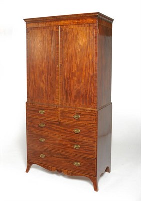 Lot 1288 - A George III Mahogany and Boxwood Strung Linen Press, late 18th century, with a dentil effect...