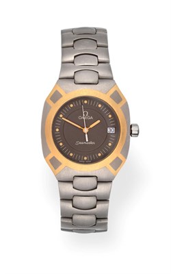 Lot 3189 - A Titanium and Gold Calendar Centre Seconds Wristwatch, signed Omega, 120m, model: Seamaster, circa