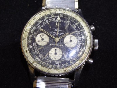 Lot 3192 - A Stainless Steel Chronograph Wristwatch, signed Breitling, Geneve, model: Navitimer, ref: 806,...