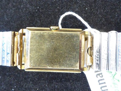 Lot 3201 - An Art Deco 9 Carat Gold Rectangular Wristwatch, signed Omega, 1935, lever movement signed and...
