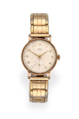 Lot 3214 - A 9 Carat Gold Wristwatch, signed Smiths, model: De Luxe, 1955, lever movement numbered...