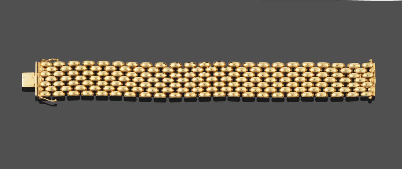 Lot 3230 - A Broad Fancy Link Bracelet, seven rows of lozenge shaped links, length 20cm see illustration