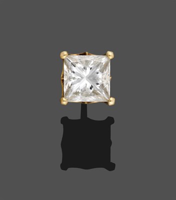 Lot 3236 - An 18 Carat Gold Single Diamond Solitaire Earring, by De Beers, the princess cut diamond in a...