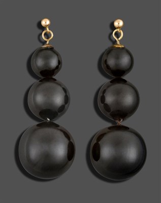 Lot 3249 - A Pair of Jet Drop Earrings, comprised of three graduated spherical jet beads, drop length...