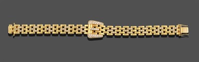 Lot 3292 - An 18 Carat Gold Diamond Bracelet, the yellow gate link bracelet with alternate central three links