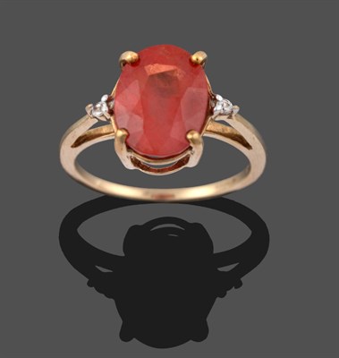 Lot 3295 - A 9 Carat Gold Orange Sapphire Ring, an oval cut orange sapphire, to round brilliant cut...