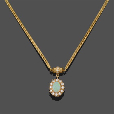 Lot 3320 - An 18 Carat Gold Opal and Diamond Cluster Pendant on Chain, an oval cabochon opal within a...