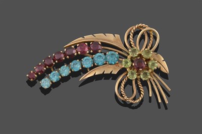 Lot 3324 - A 9 Carat Gold Blue Zircon, Garnet and Green Stone Brooch, a graduated curved row of round cut blue