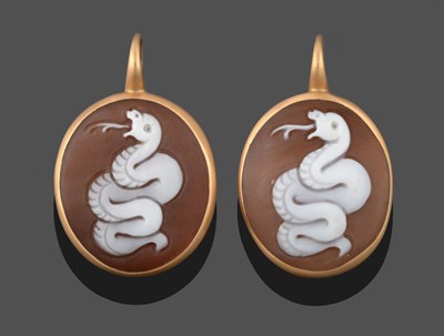 Lot 3330 - A Pair of Cameo Earrings, depicting a snake in yellow rubbed over settings, length 3.7cm, with hook
