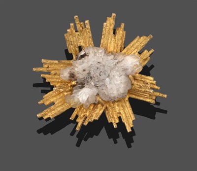 Lot 3337 - A 9 Carat Gold Quartz Crystal Burst Brooch, the quartz of natural form, in a yellow textured...