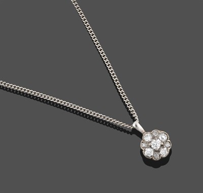 Lot 3343 - A Diamond Cluster Pendant on Chain, the central round brilliant cut diamond in a white claw setting